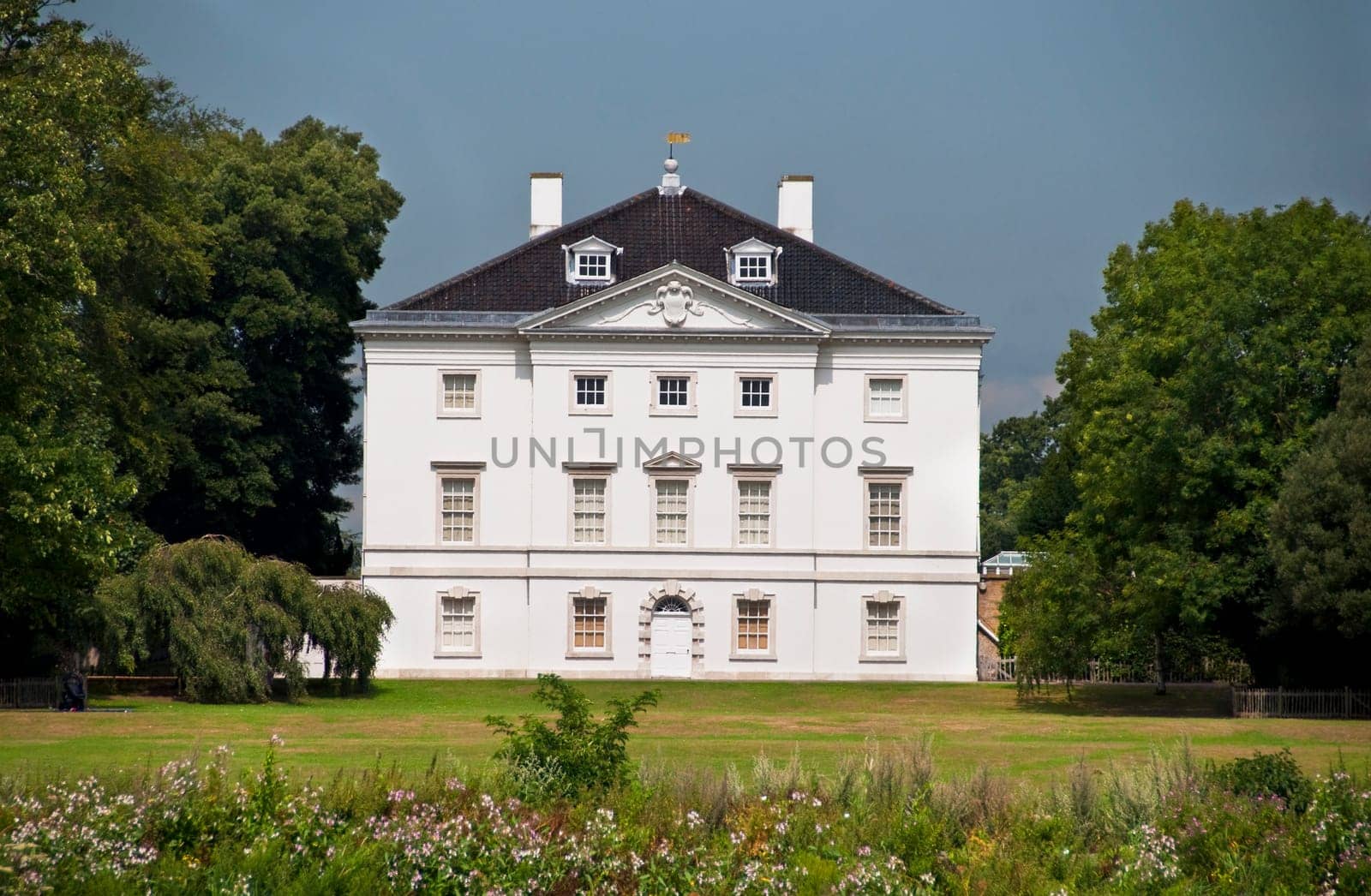 White house in a park, England