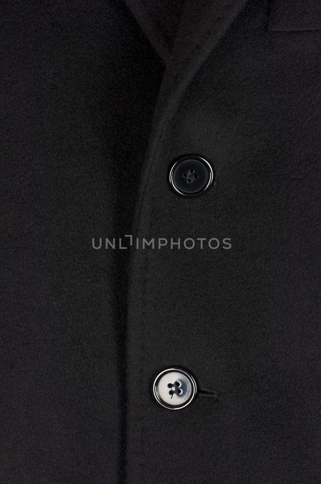 Black woolen coat closeup, male fashion