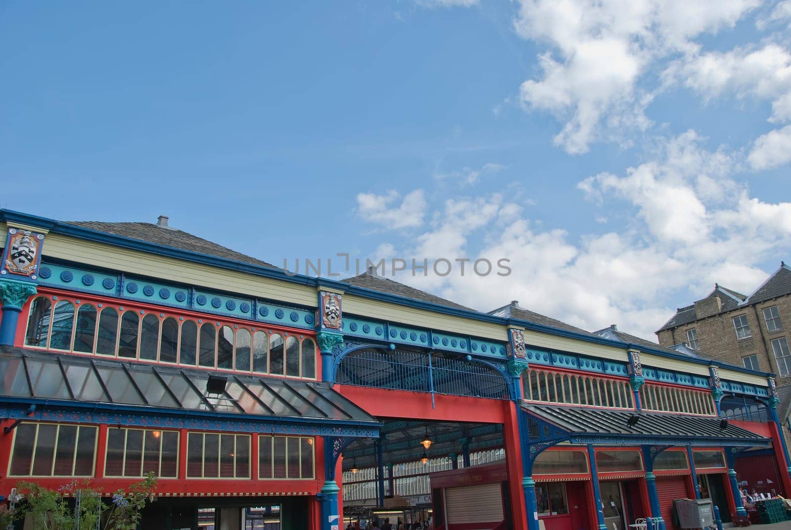 The Ornate Brightly Coloured Cast Iron Facade of a Victorian Era Market Hall