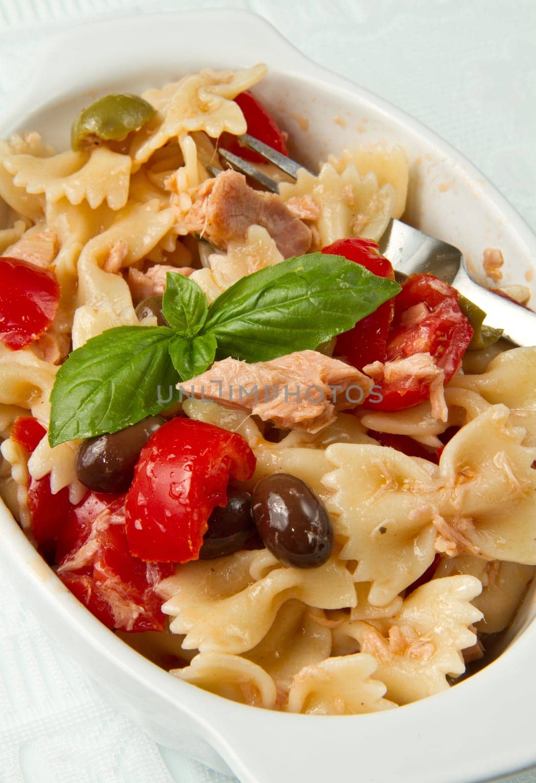 pasta salad with tomatoes,tuna and olives