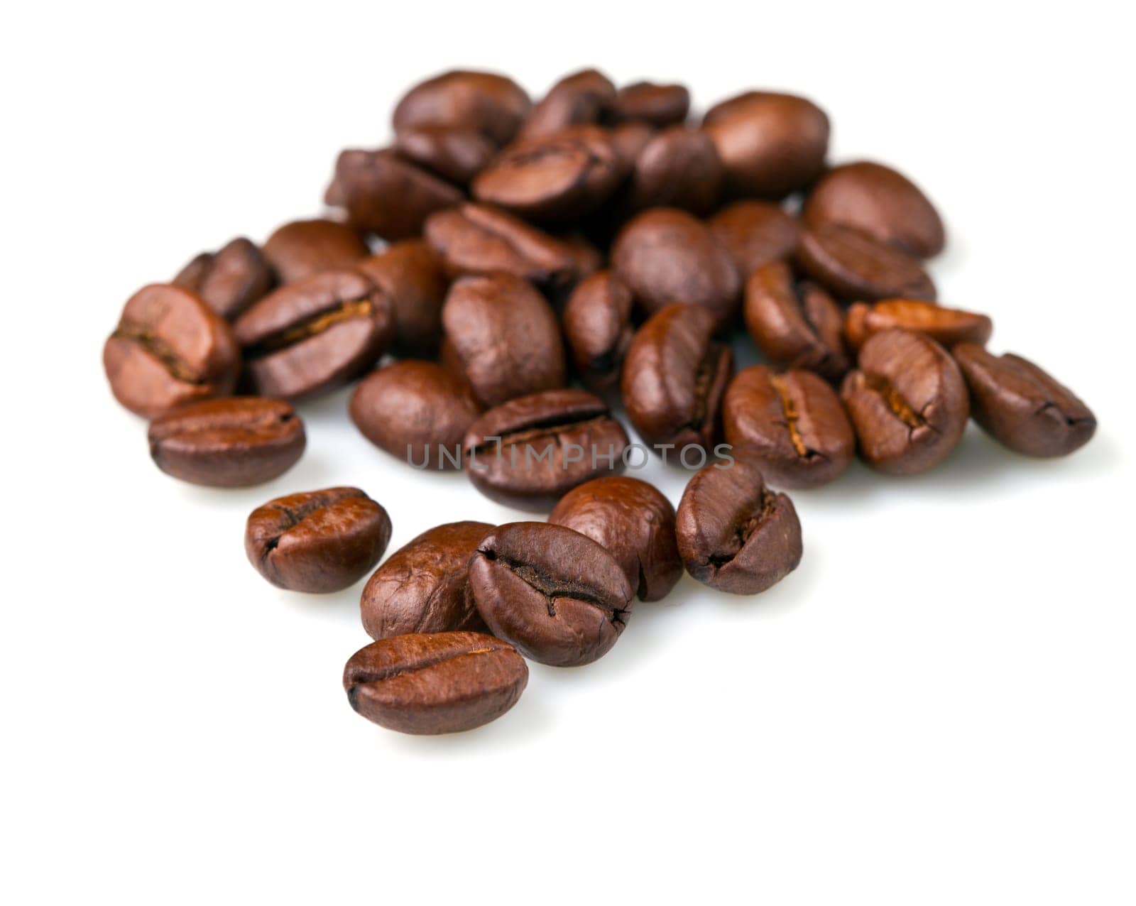 macro shot of coffee beans isolated on white background