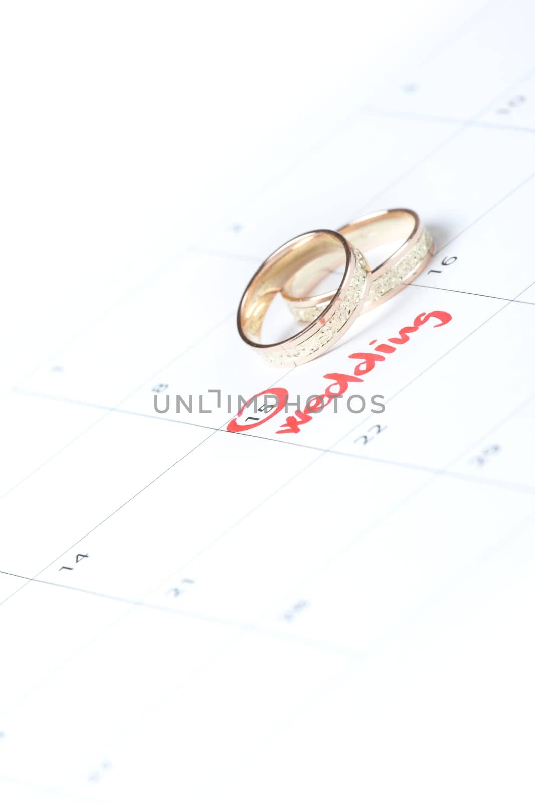 Wedding rings and word wedding in calendar