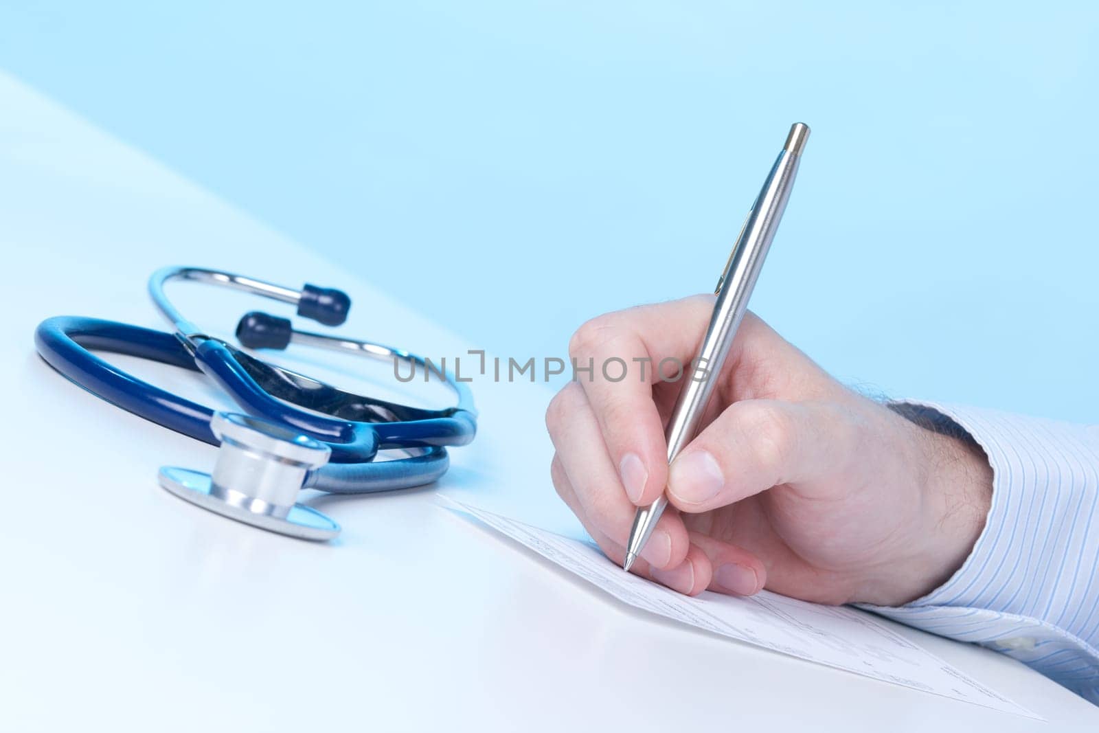 Family doctor write prescription (recipe)