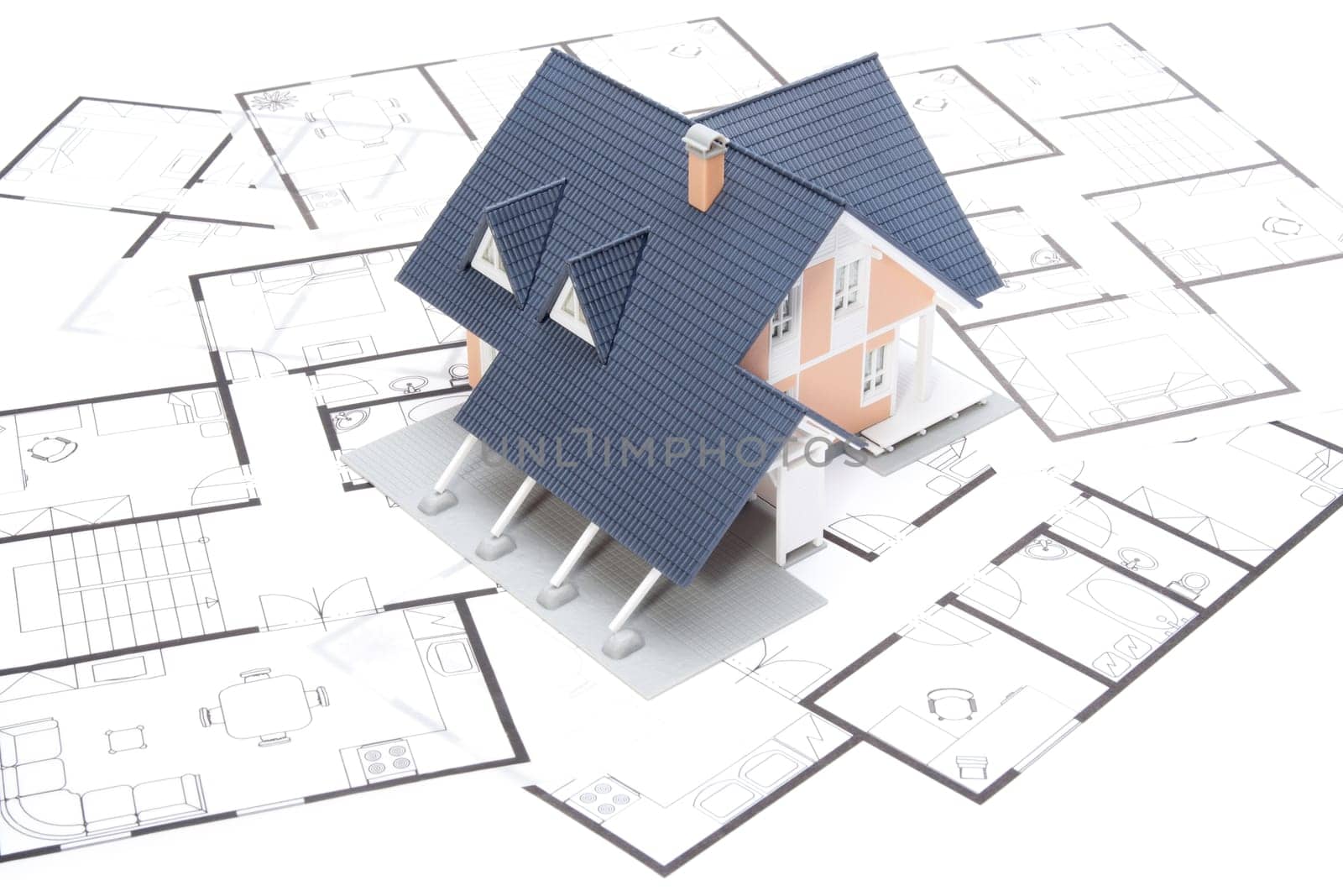 Model of the house on blueprints
