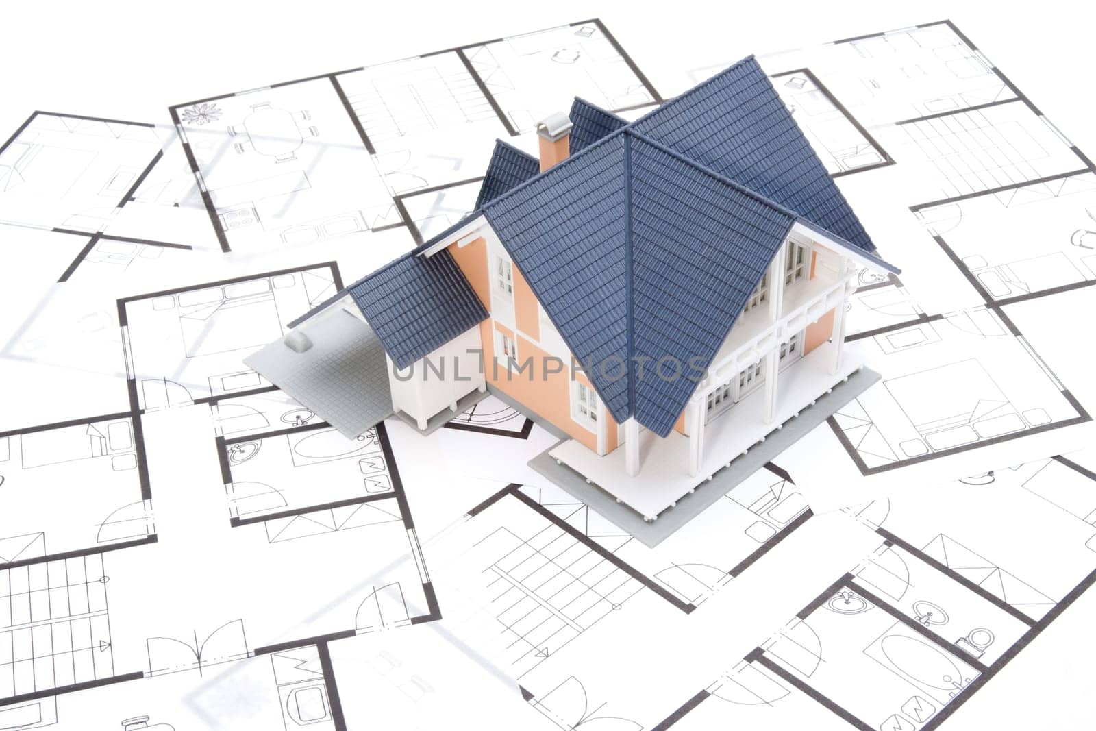 Model of the house on blueprints