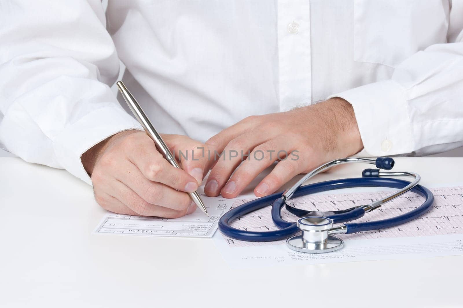 Family doctor write prescription (recipe)
