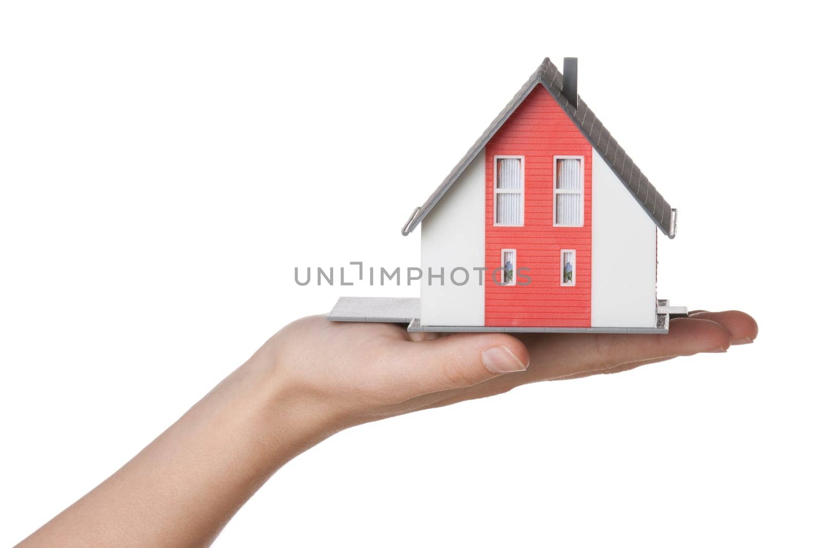 House agent offer new house represented by model against white background