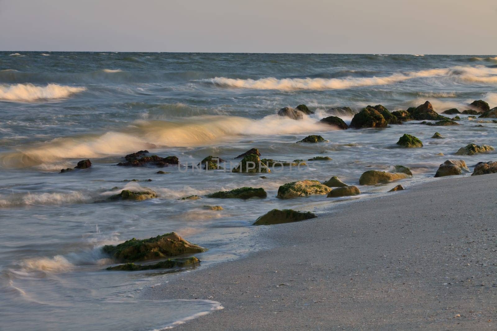 waves and rocks on a wild beach