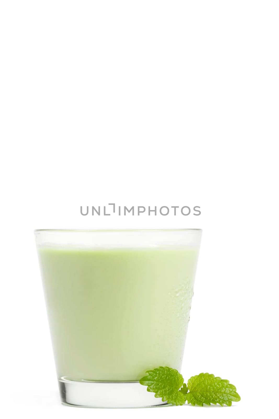 Melissa next to milkshake on white background