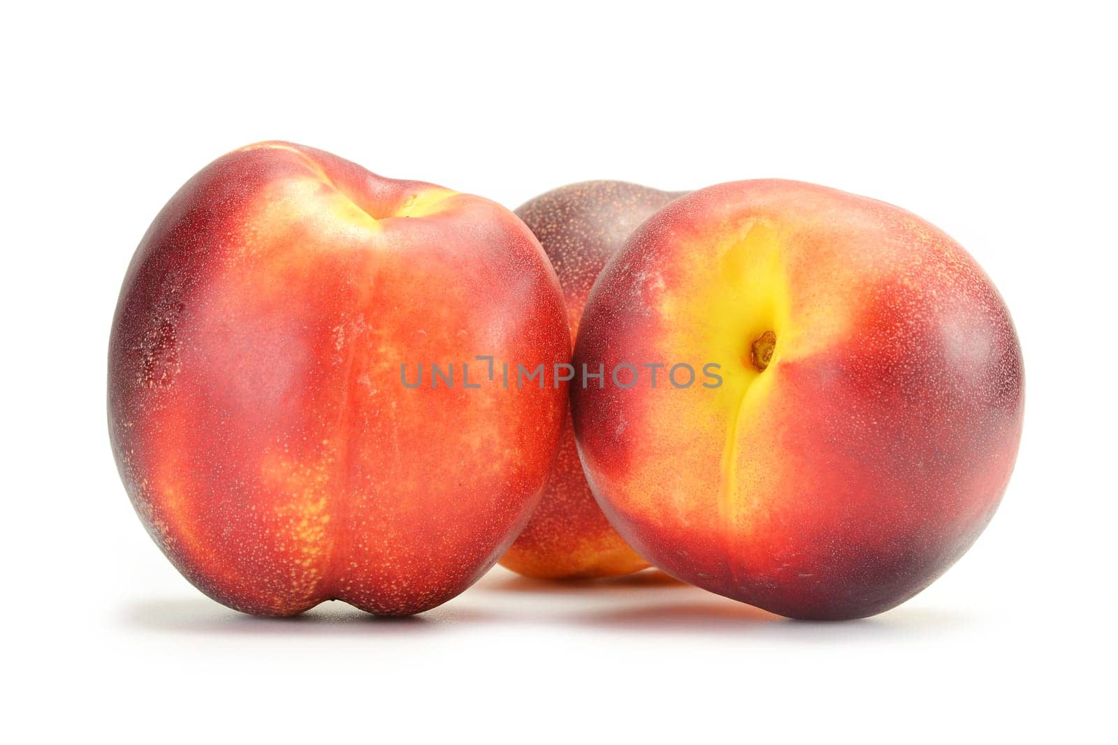 Fresh ripe peaches isolated on white