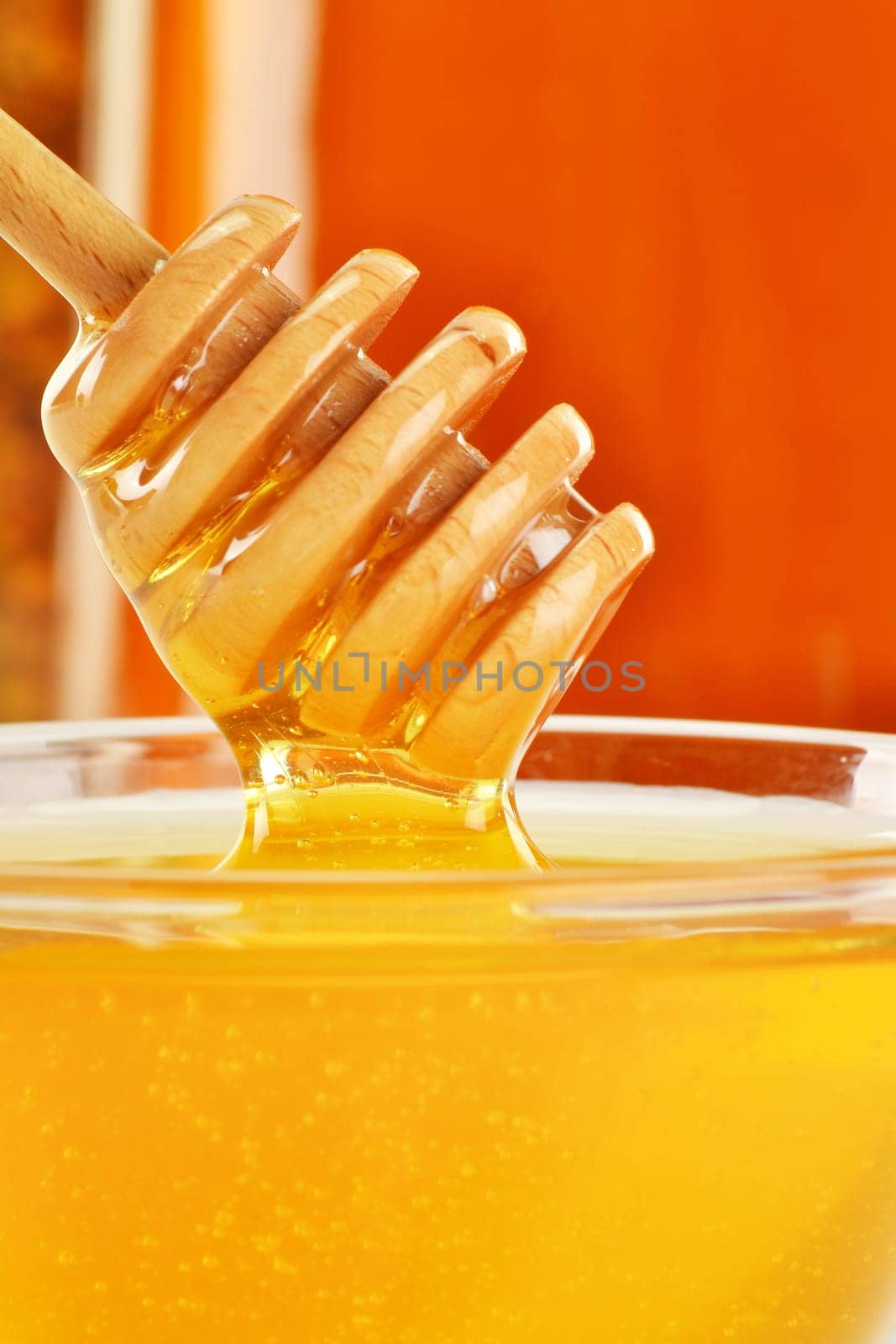 Composition with dish of honey and stick