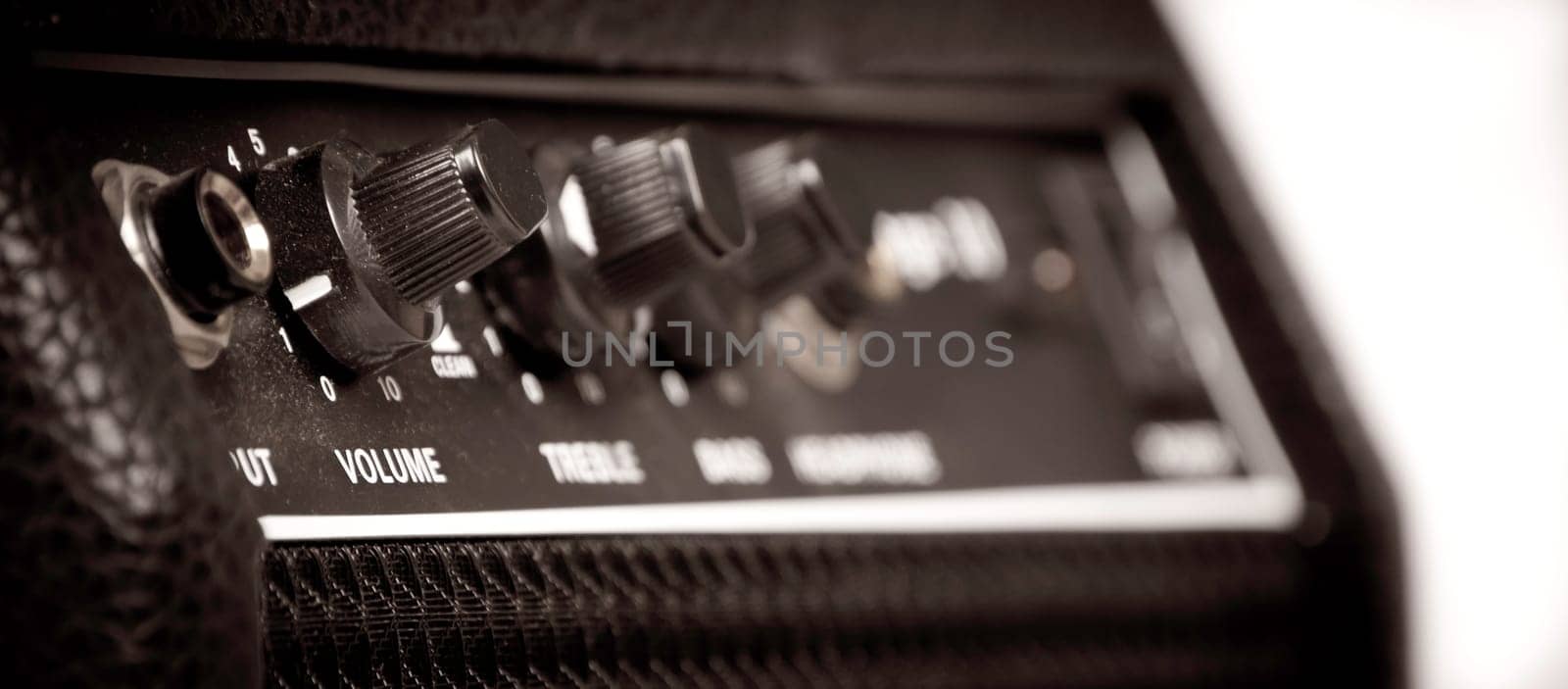 Knobs of different functions on a guitar amp