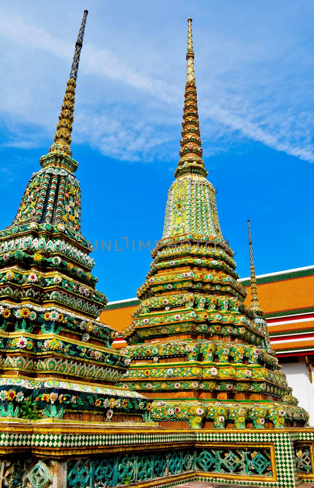 A mosiac colored wat in the center of Bangkok, Thailand on a sunny day