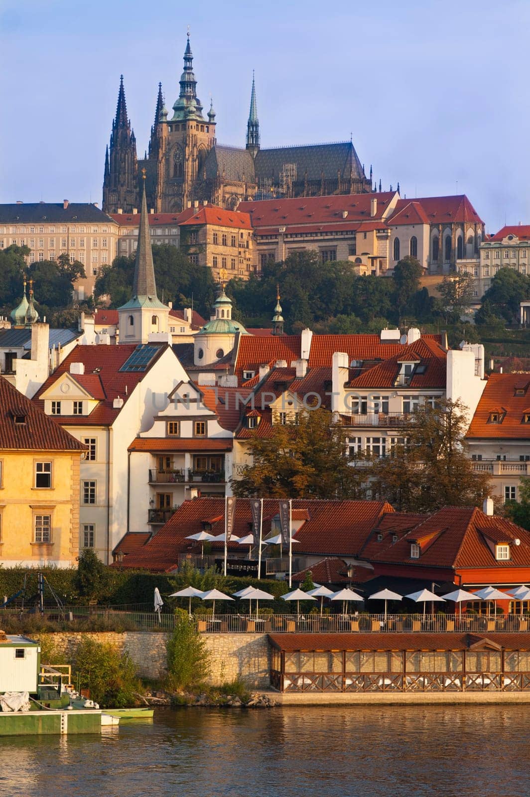 A distant view of the castle and prague from the famous bridge