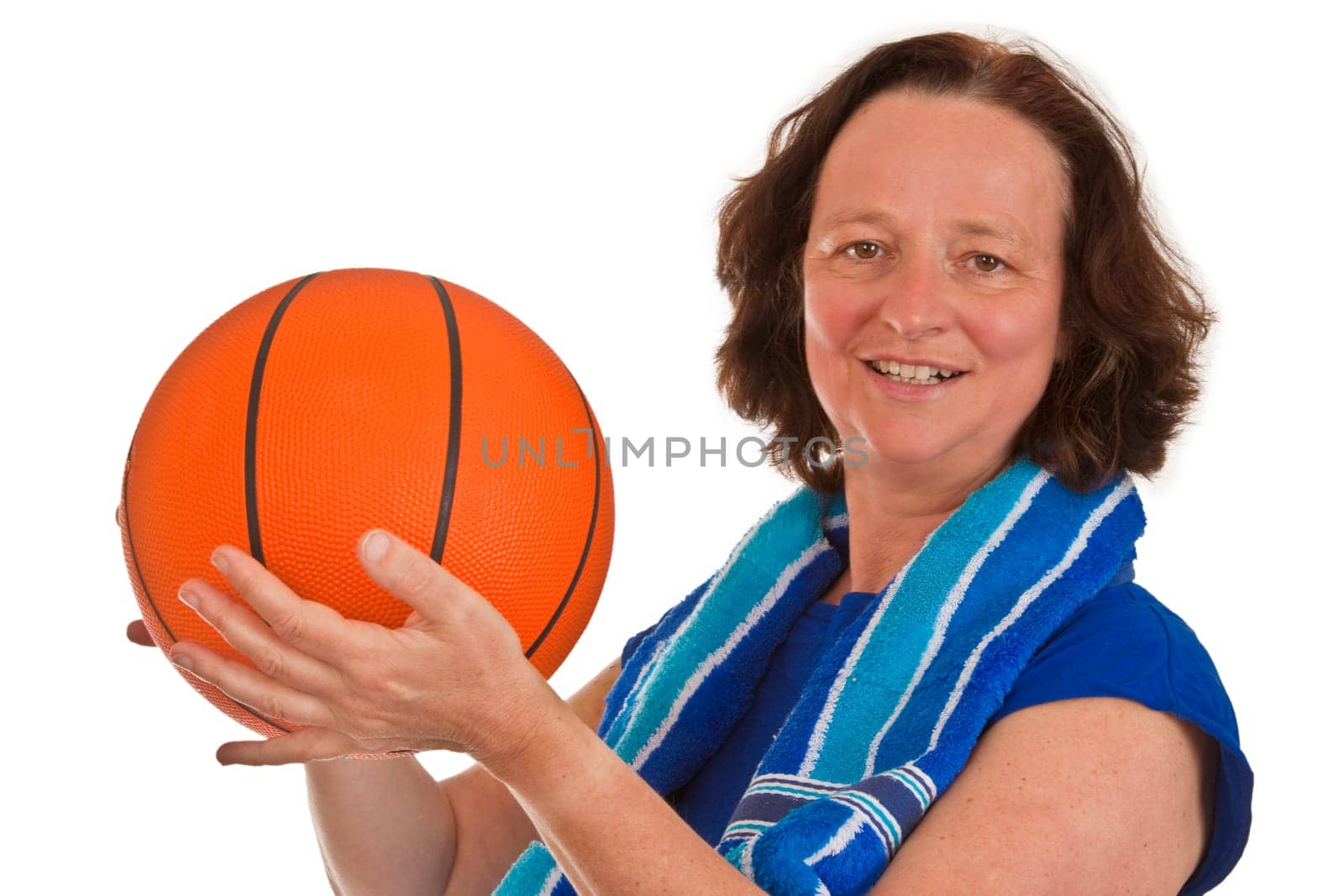 Middle-aged woman with basketball isolated on white background