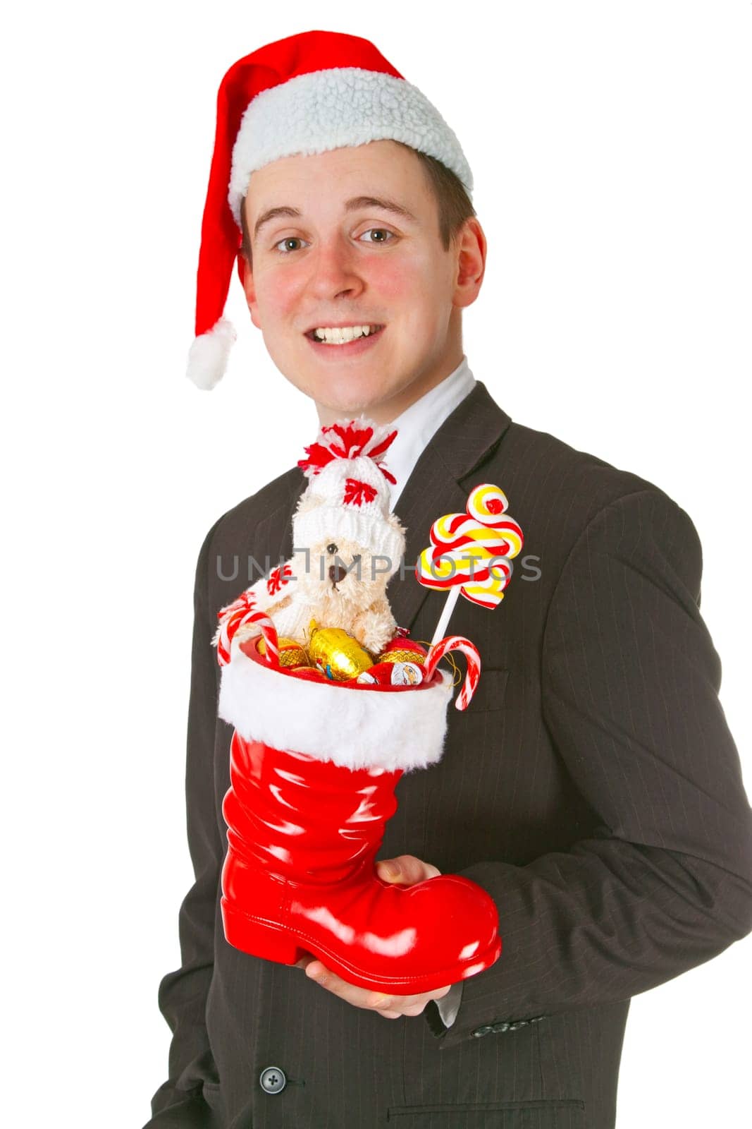 Businessman with Santa hat isolated on white background