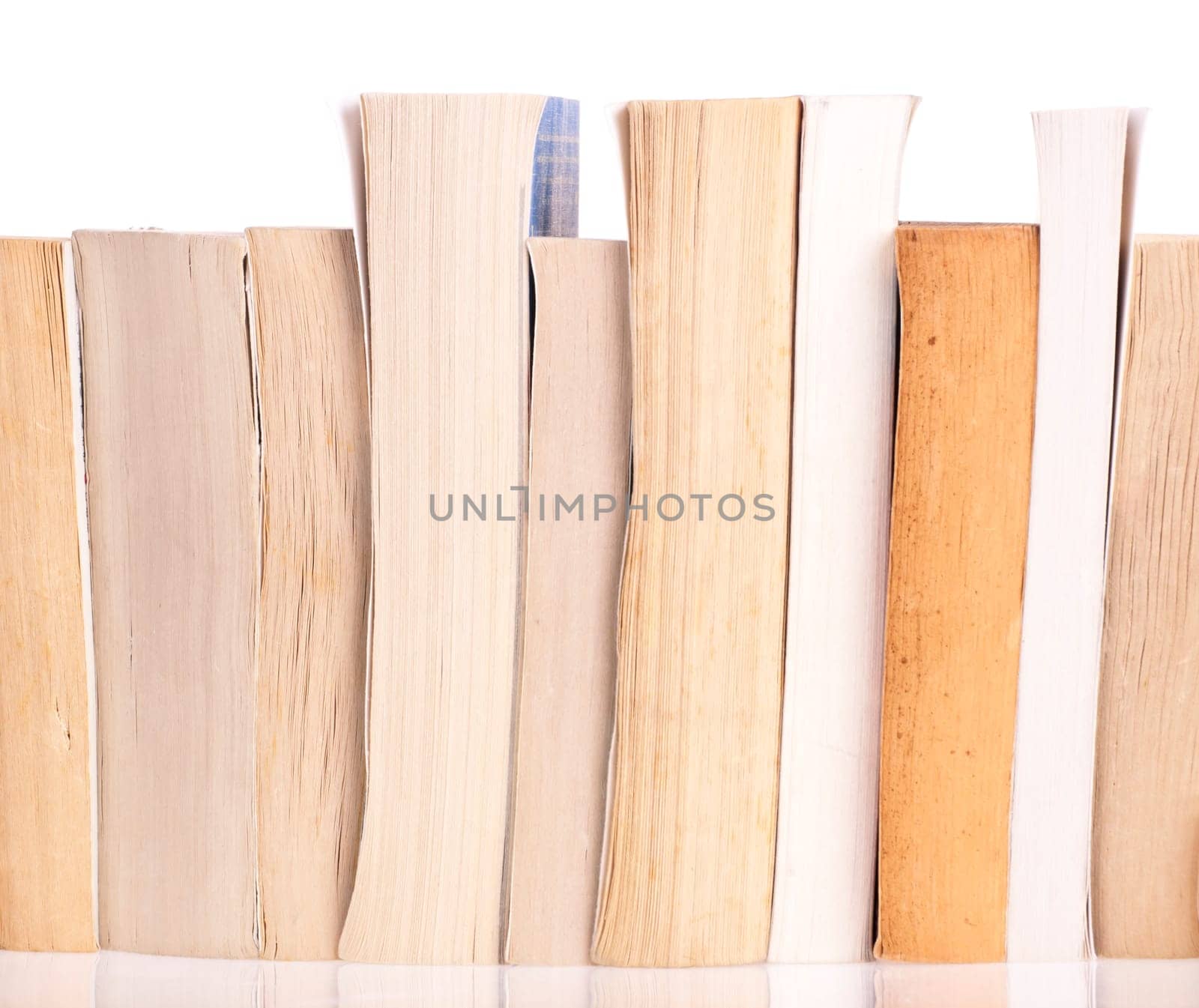 Stack of old books on a white background