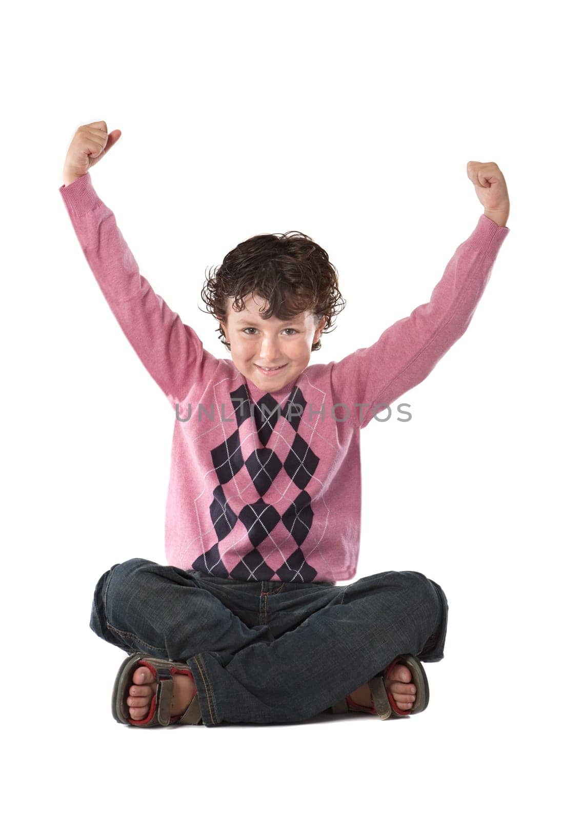 Happy child sitting on a over white background