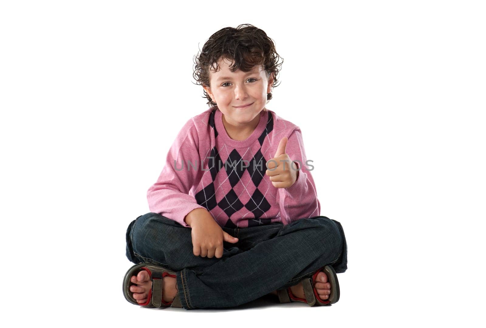 Child with his finger saying OK isolated over white