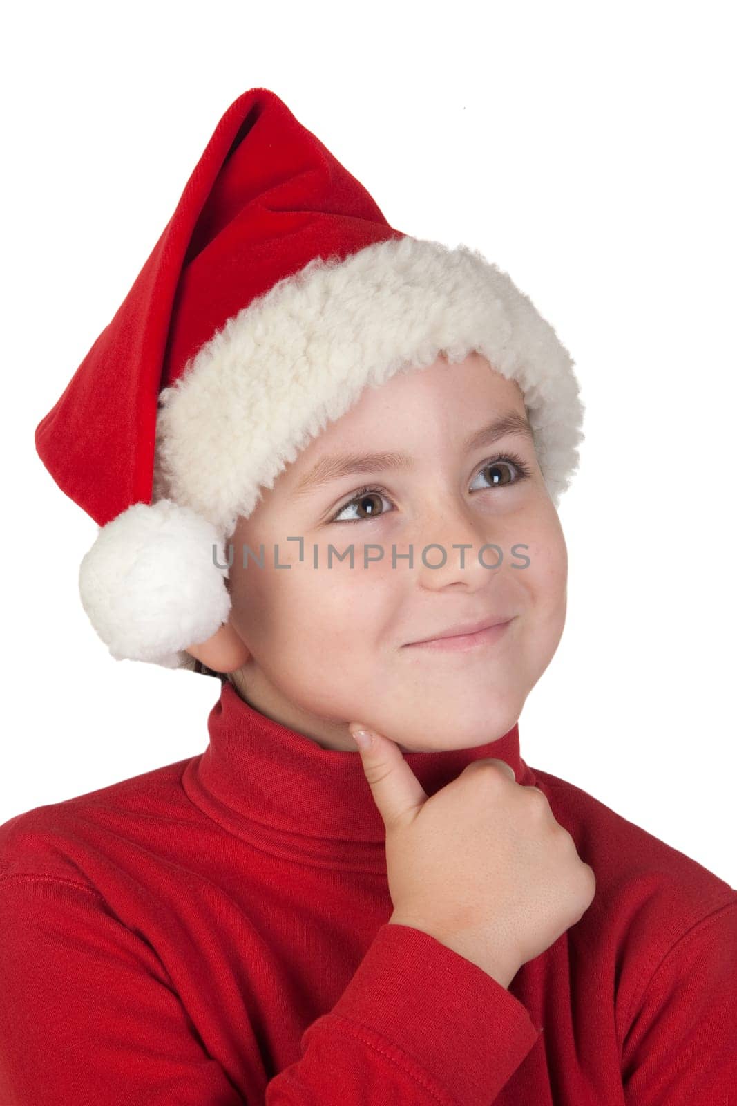 Adorable boy with santa hat isolated thinking on white background