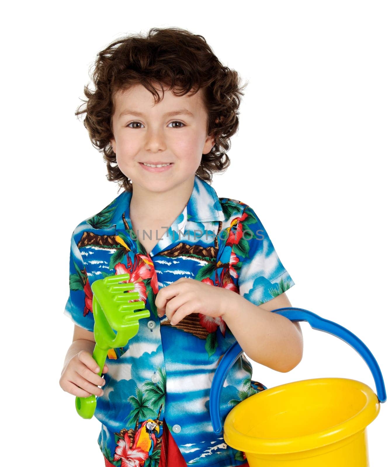 adorable boy playing in the beach over a white back ground