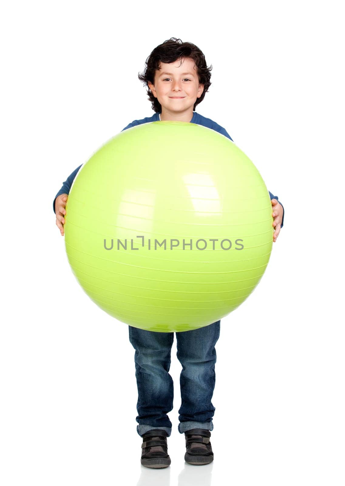 Child holding a pilates ball isolated on a over white background