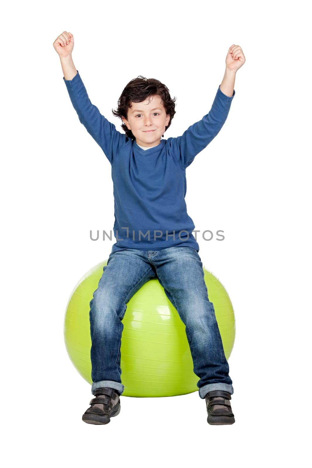 Child sitting on a pilates ball isolated on a over white background