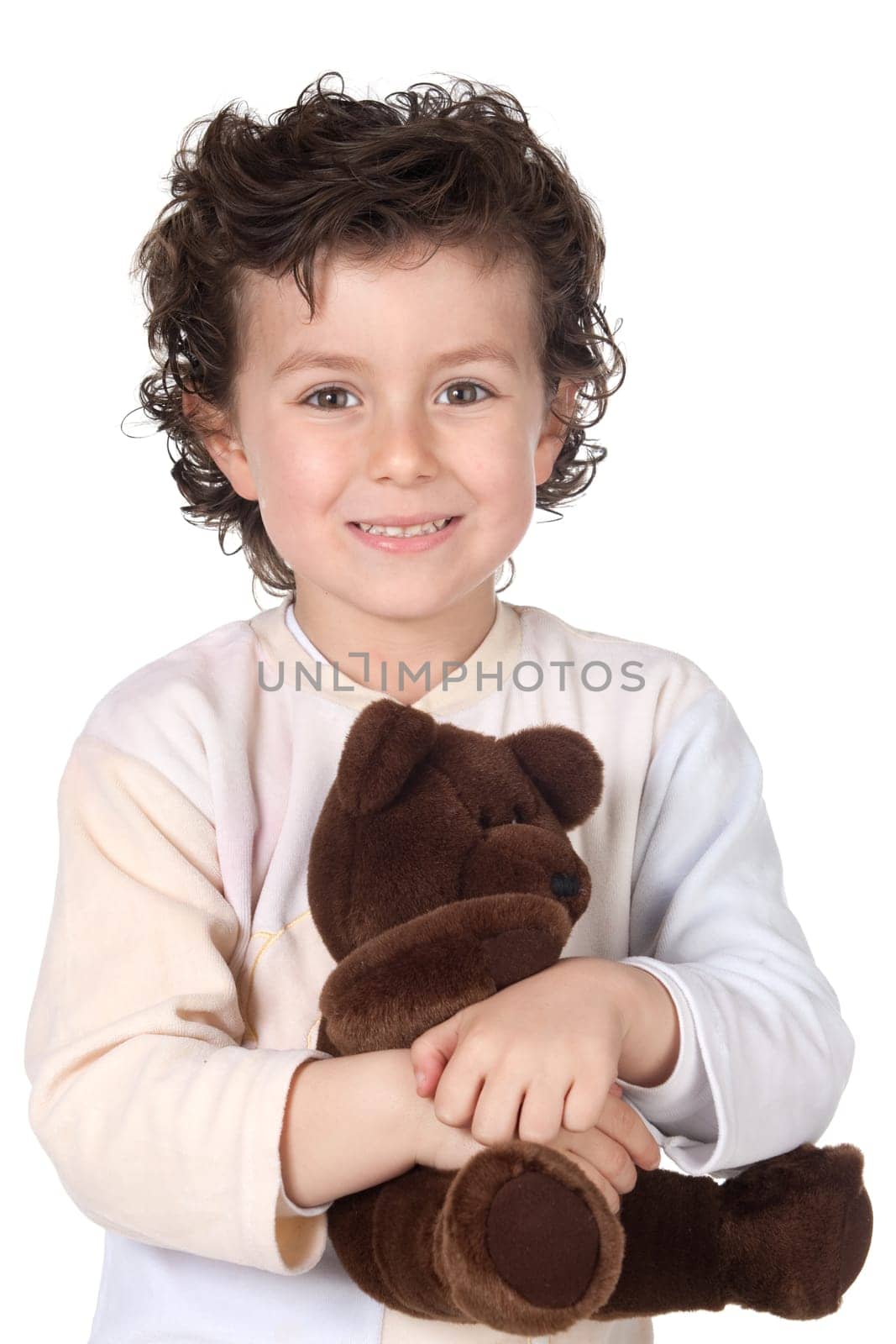 Pretty boy in pajamas with teddy bear isolated on white background