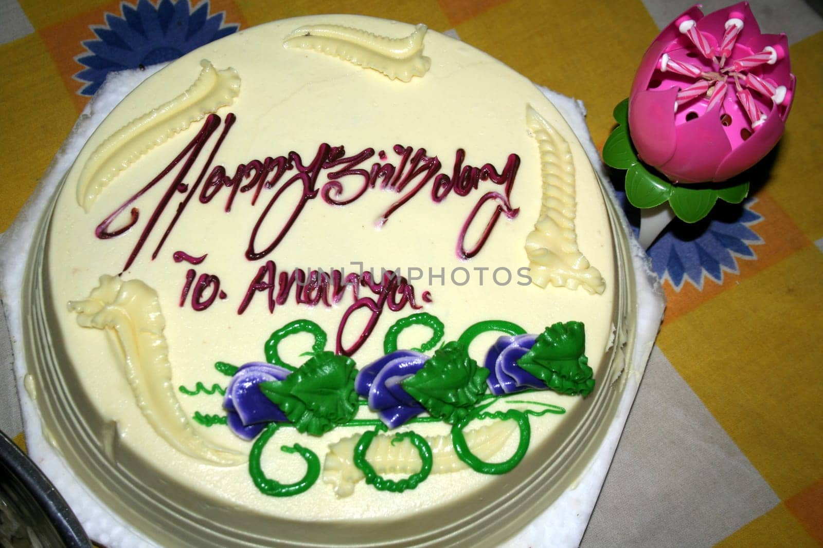 Decorated Birth Day cake and automatic flower candle