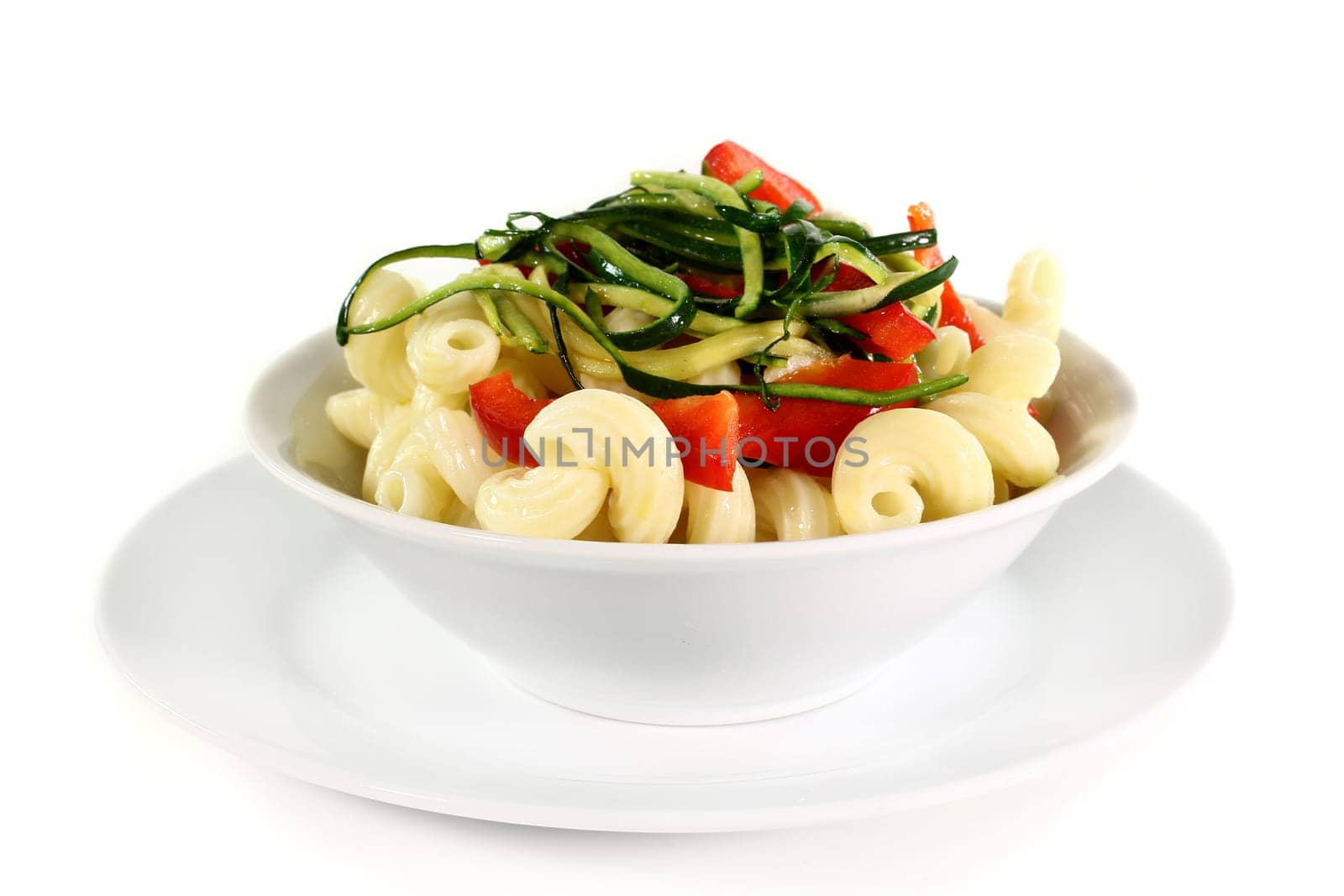 a white bowl with a vegetarian pasta dish