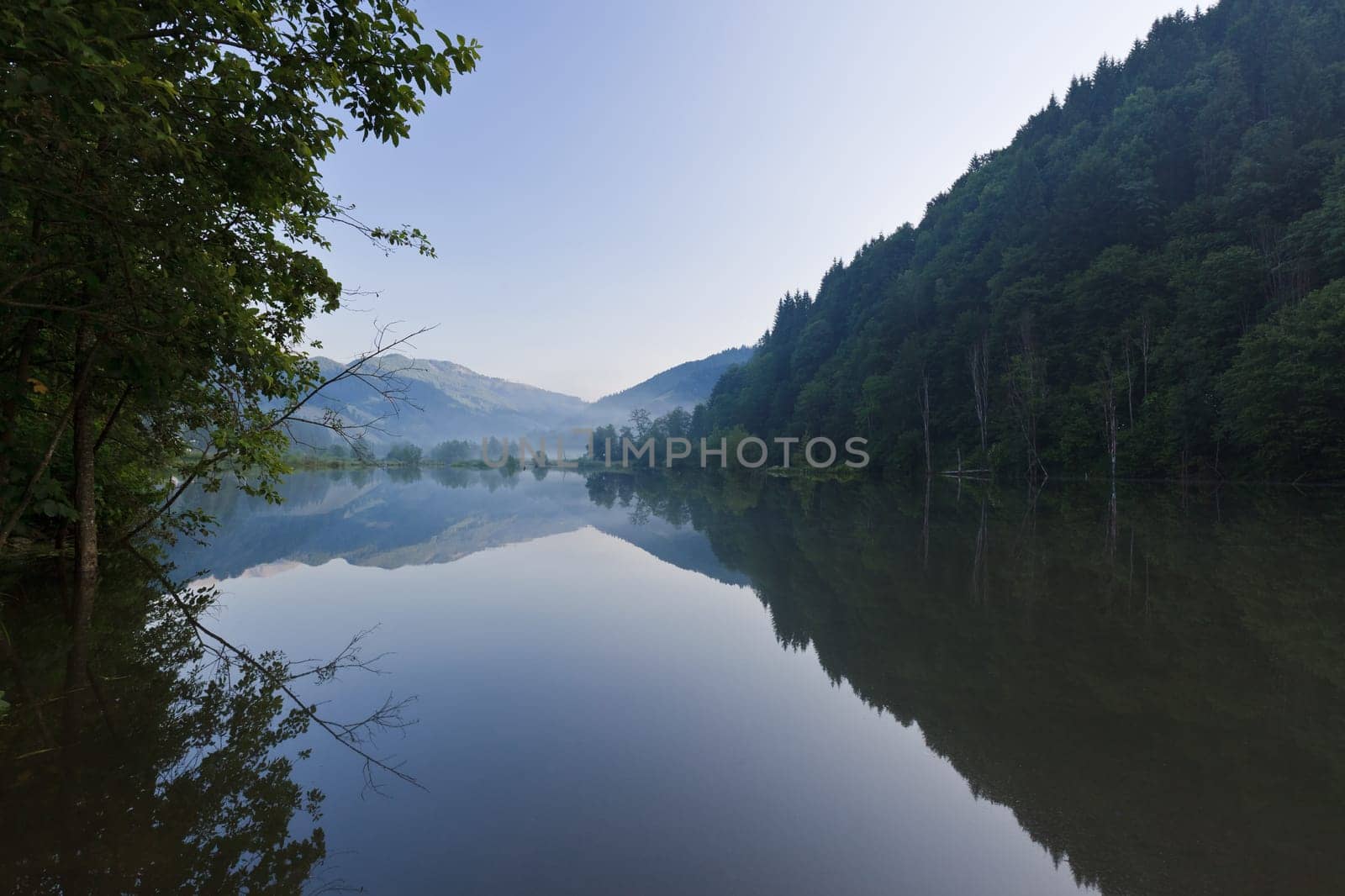 reflections on the lake before a sunrise