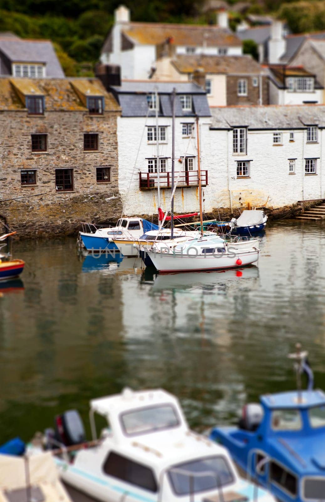 Polperro harbor in Cornwall. Historic cornish fishing village with boats and cottages
