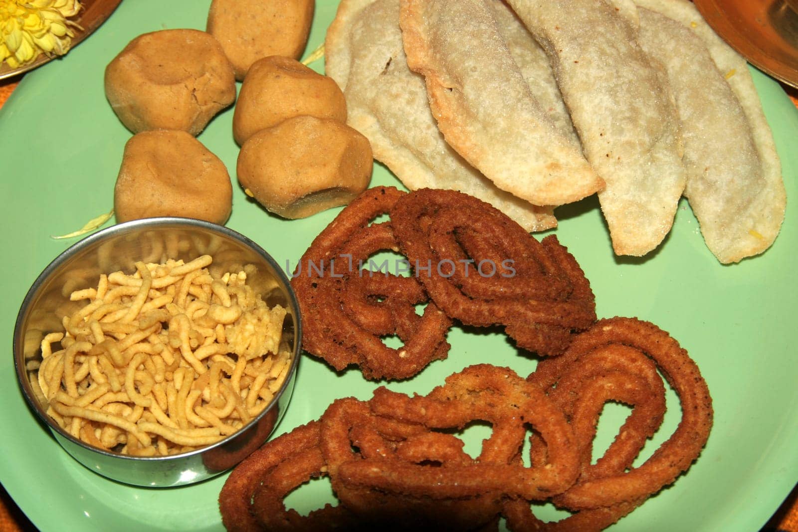 Variety of Indian sweets and hot, salty snacks