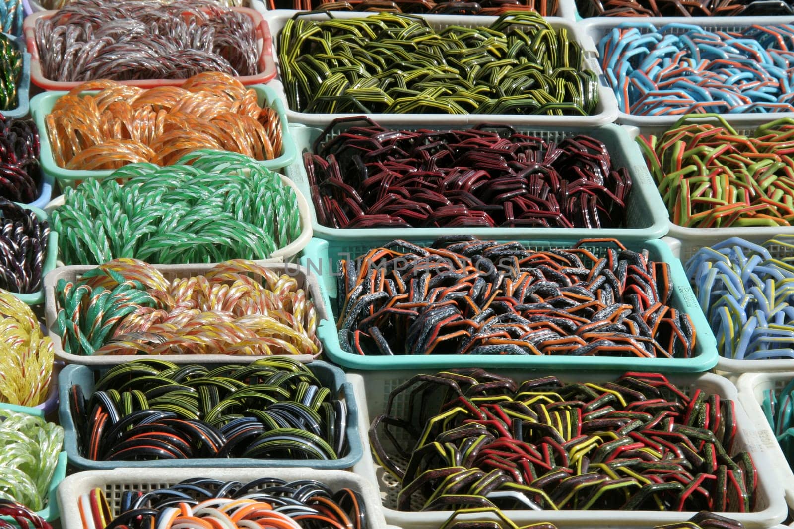 Rows of trays with variety of bangles