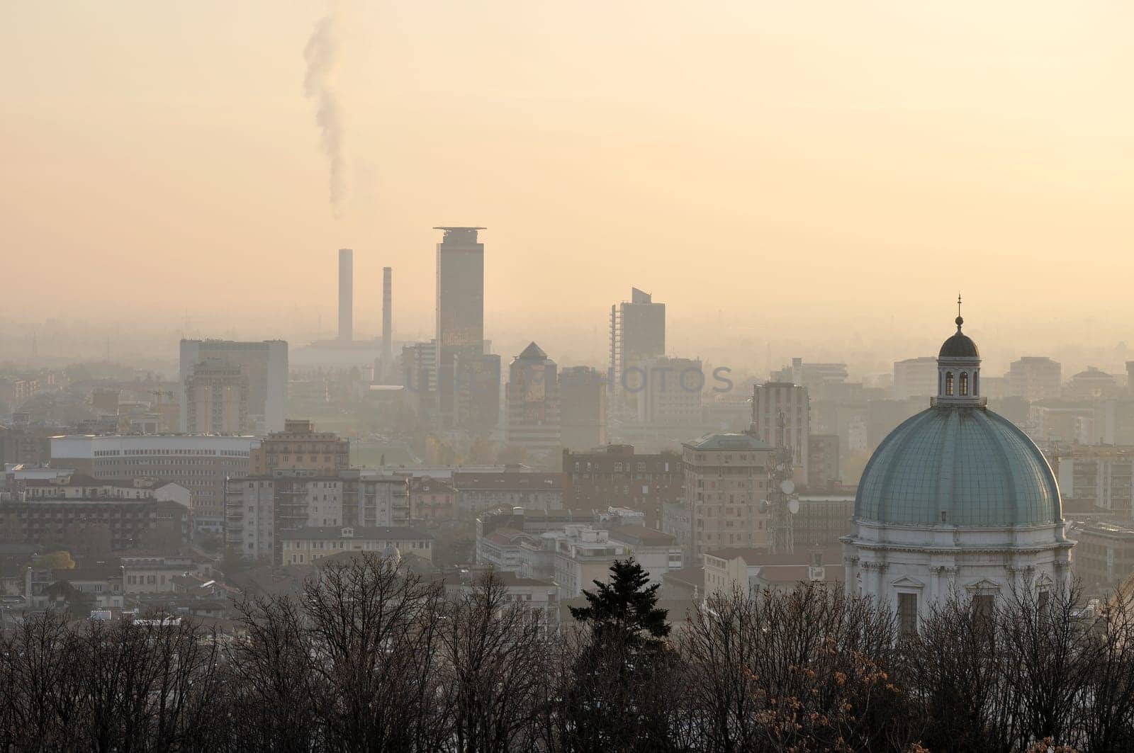 foggy city skyline, brescia