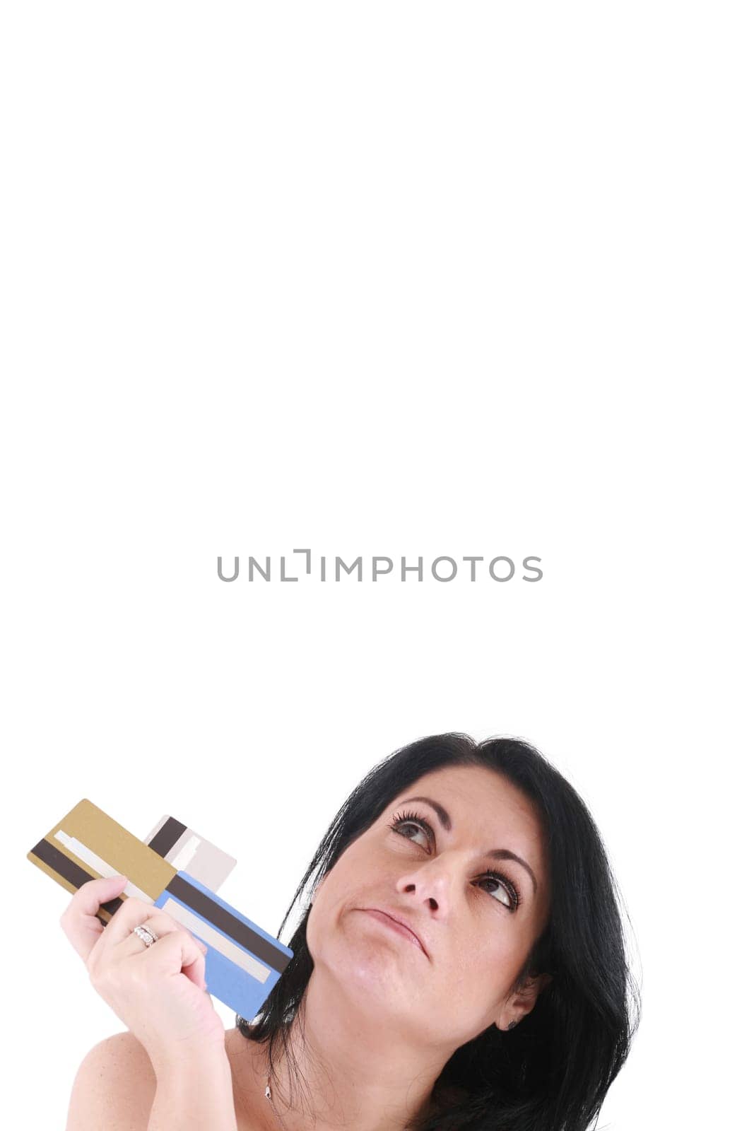 upset robed woman glaring at her many credit cards