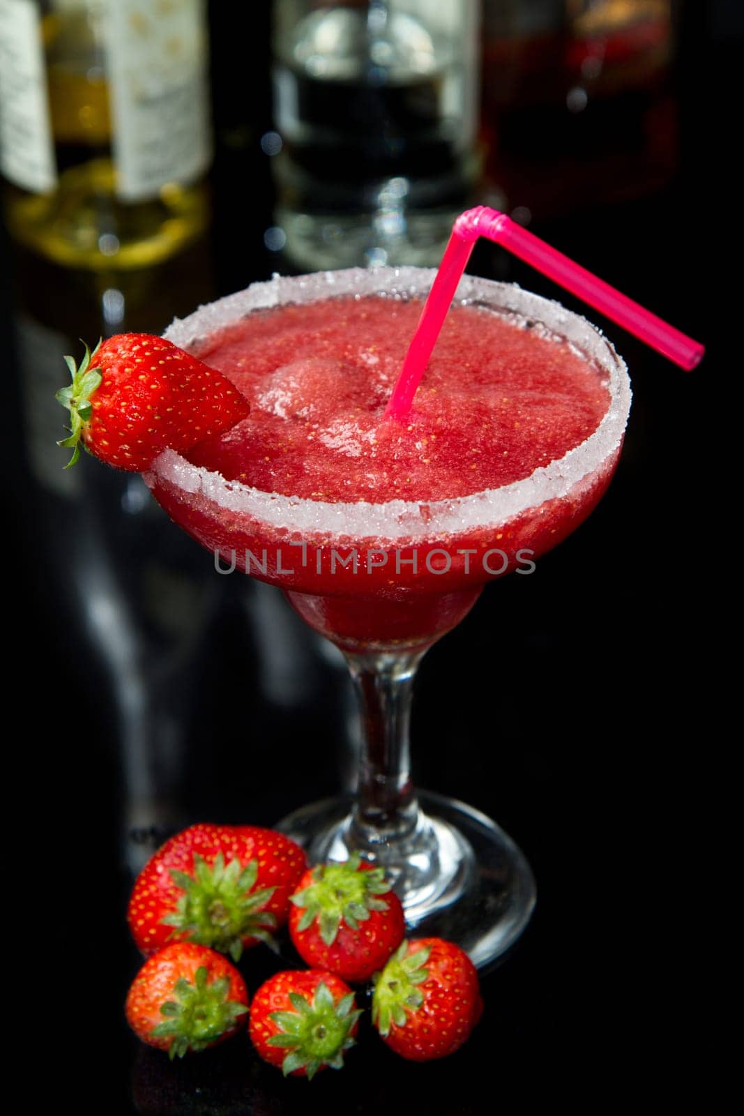 strawberry cocktail on black background