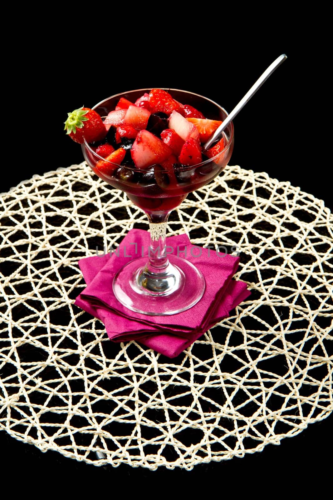 fresh fruit salad on black background