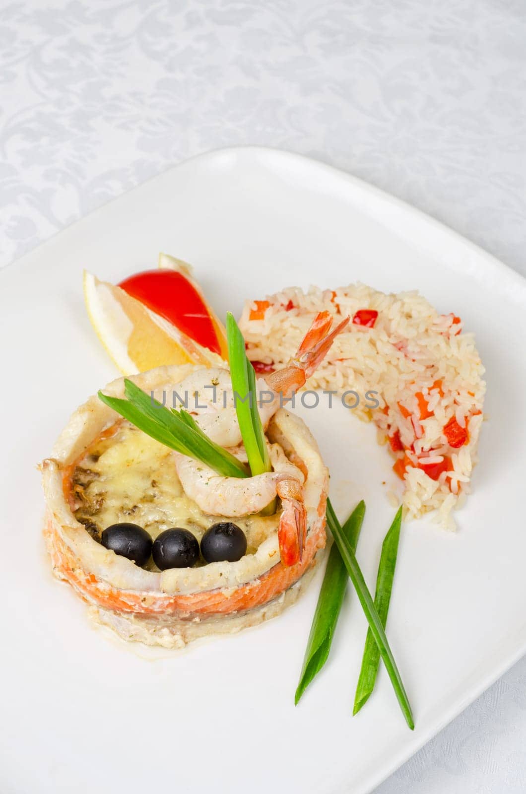 tasty prepared fish with rice and vegetables