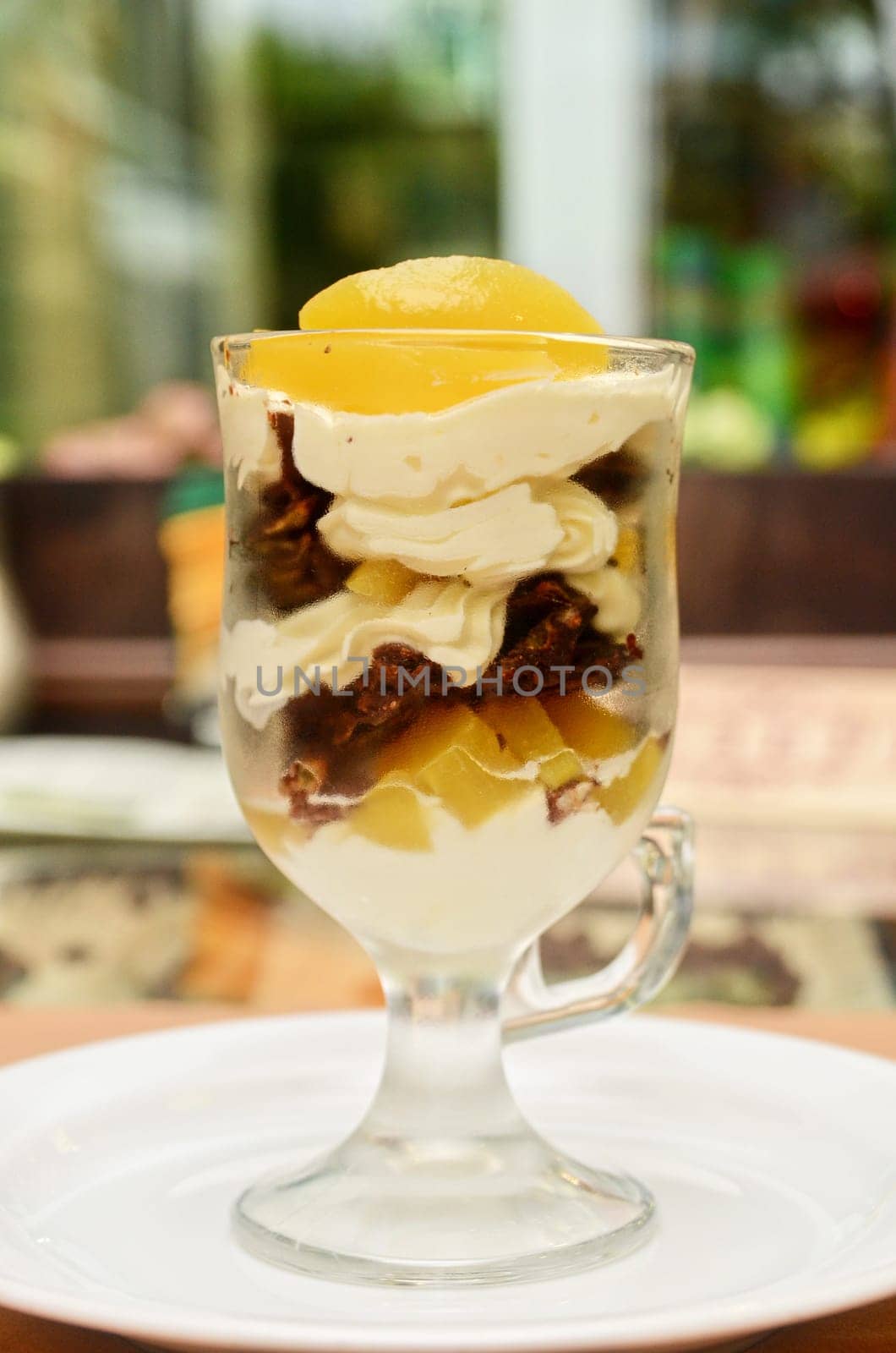 fresh baked cupcake with orange slices on a plate