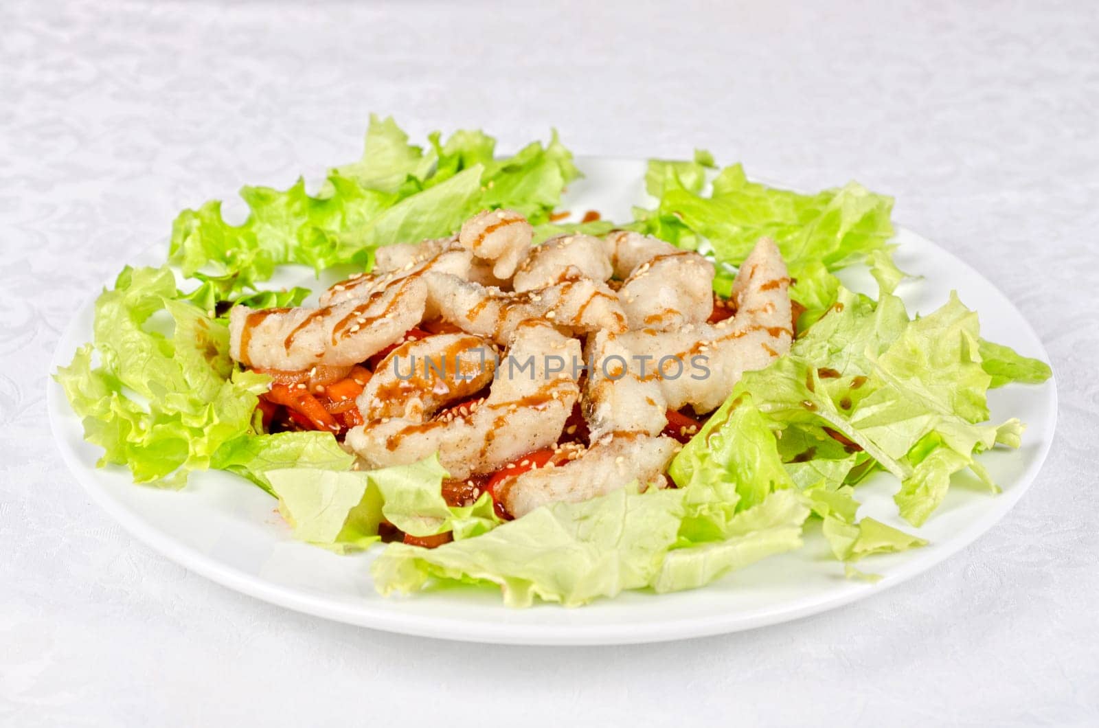 Dish of roasted filet pikeperch with vegetables
