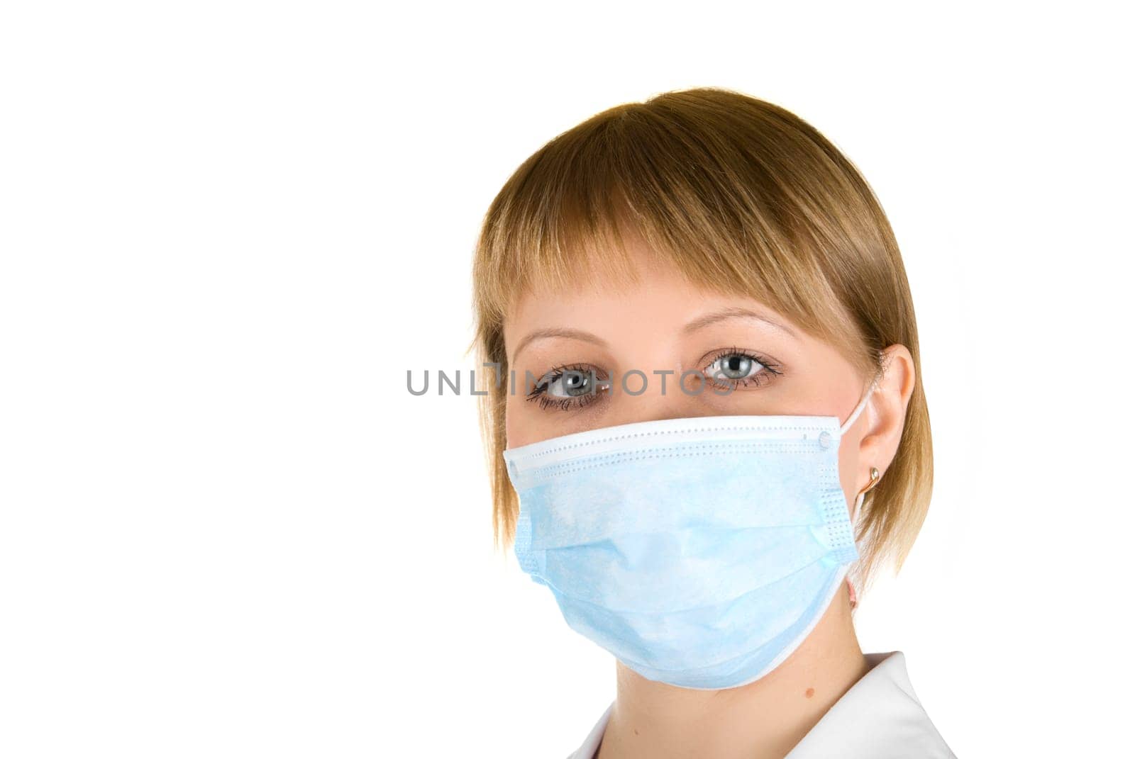 Beautiful young doctor with syringe isolated on white background