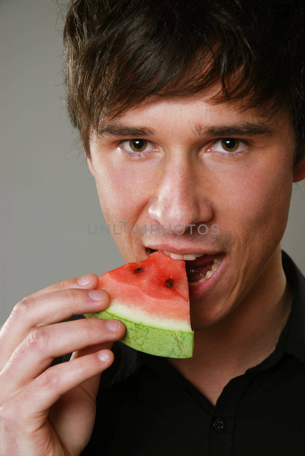 Young man with melon