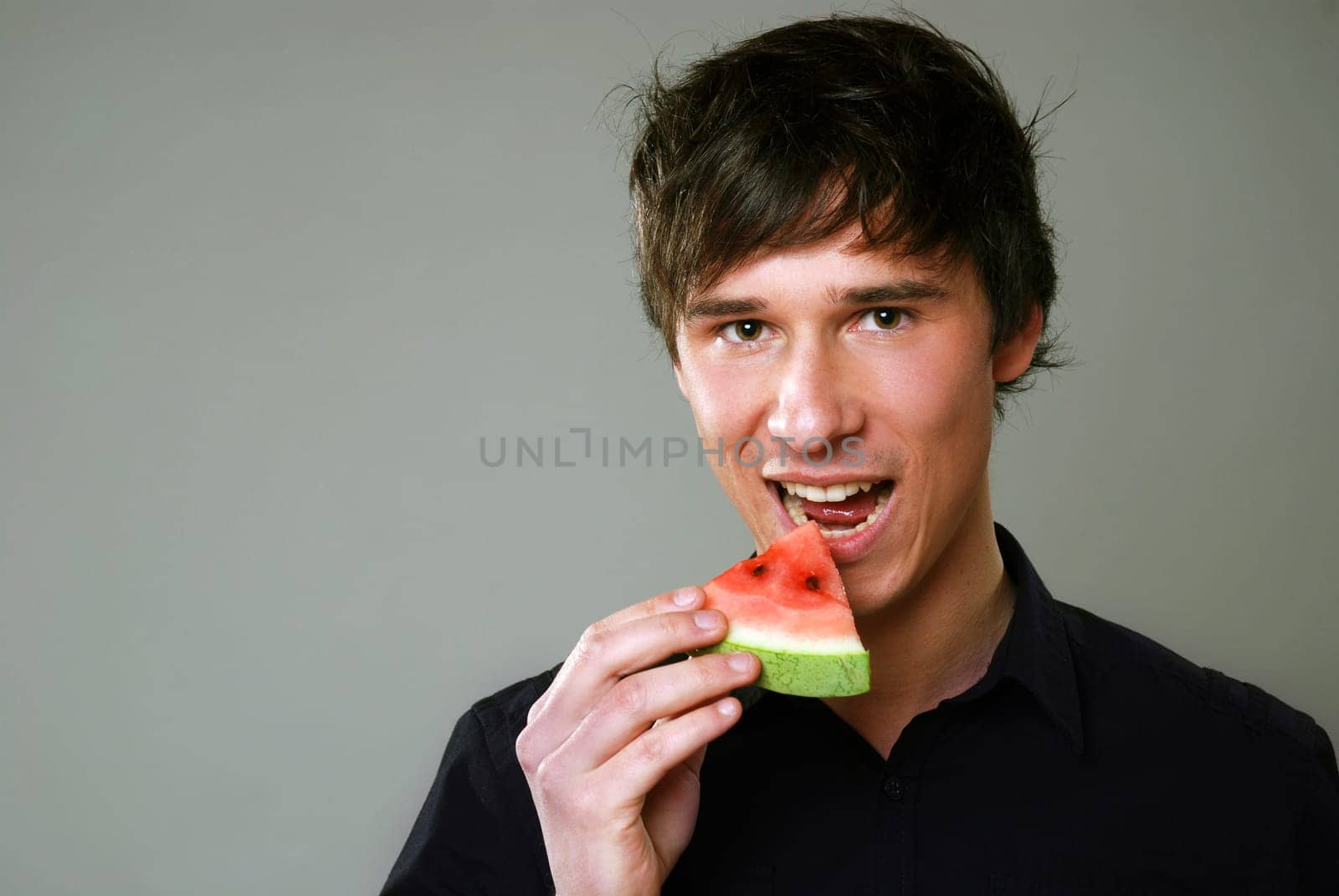 Young man with melon