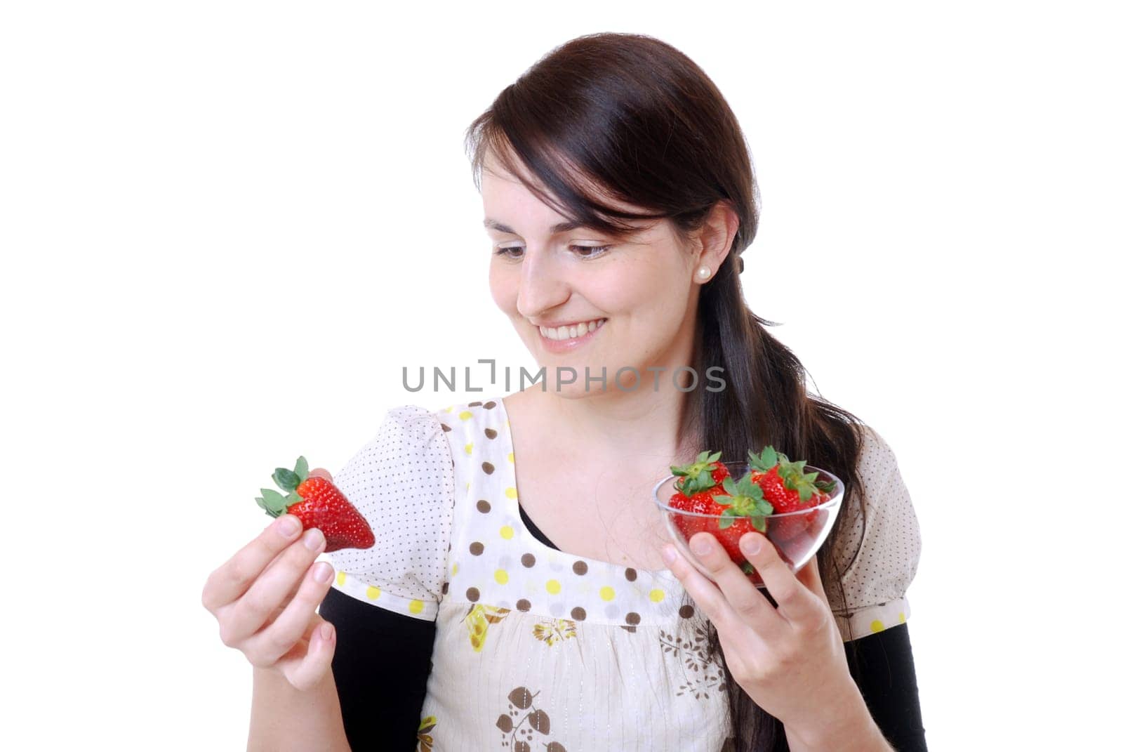 Young woman with strawberries
