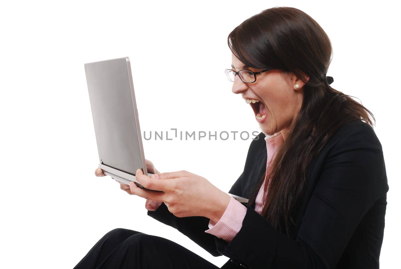Screaming woman with laptop