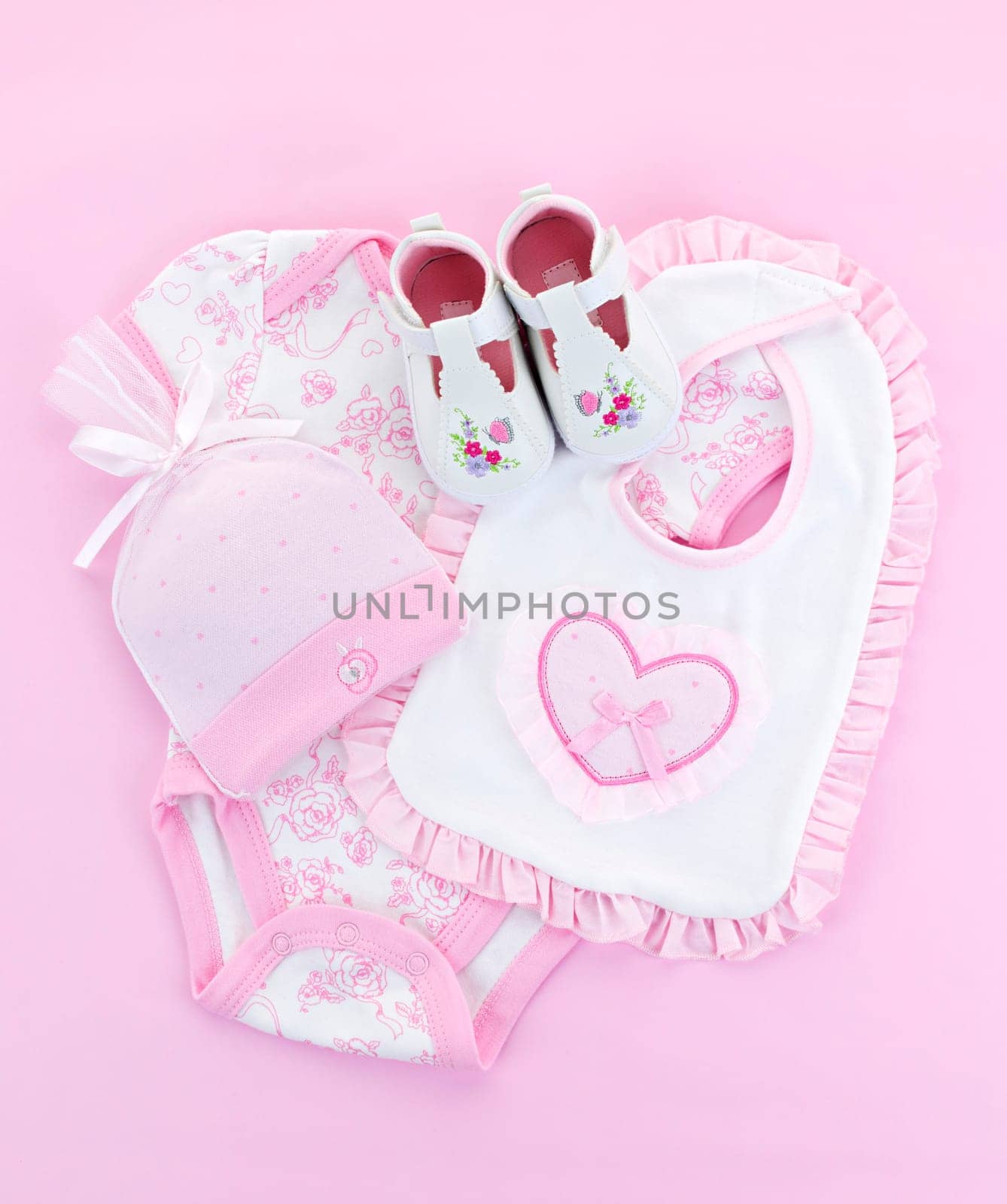 Pink infant girl clothing for baby shower