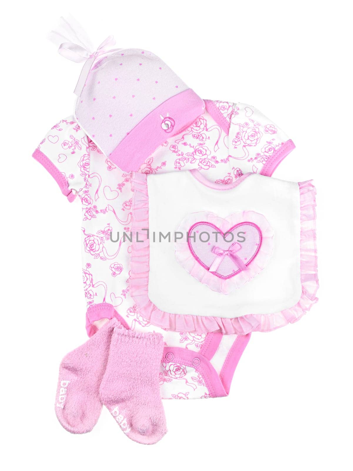 Pink infant girl clothing for baby shower isolated on white background