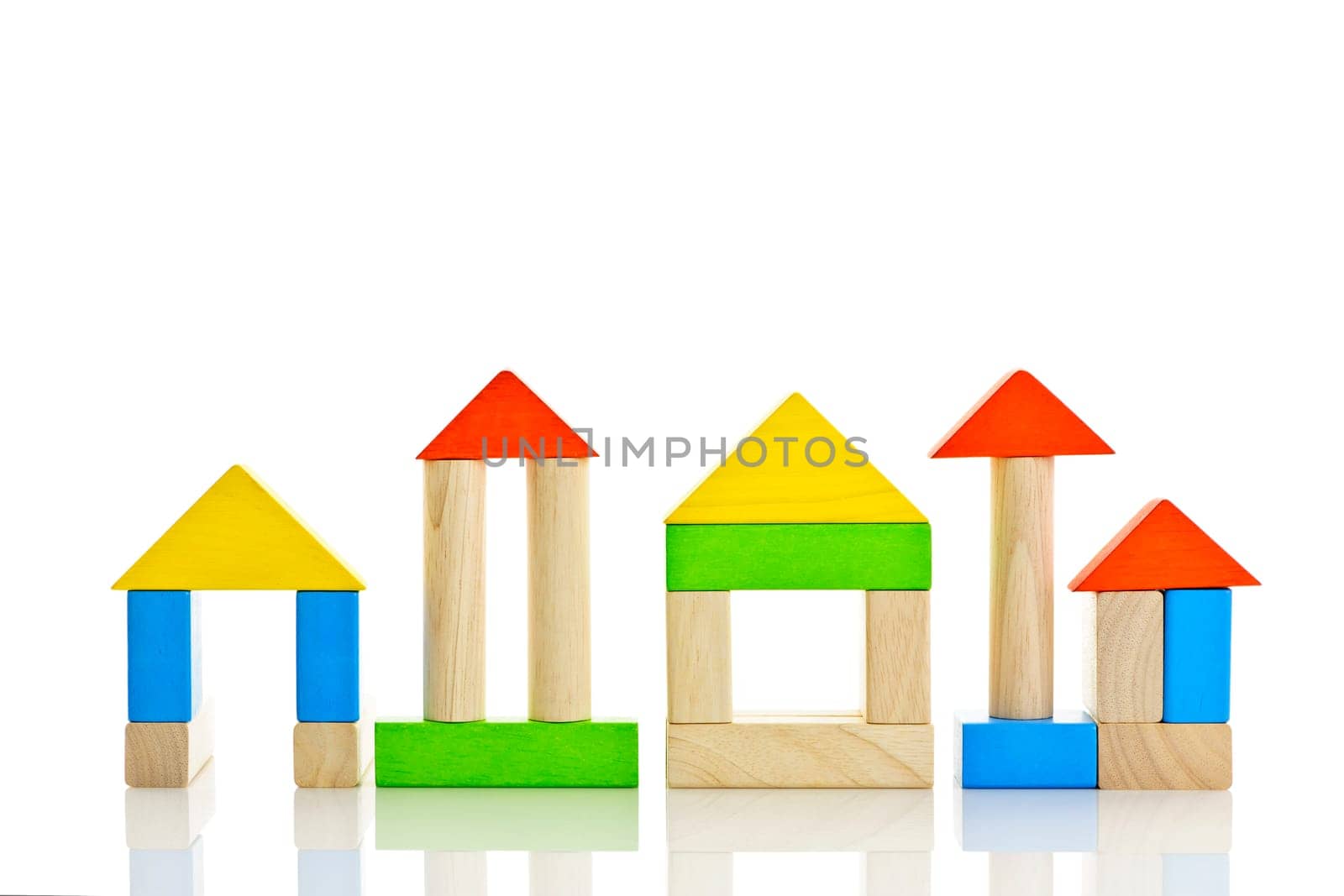 Buildings constructed out of toy wooden building blocks