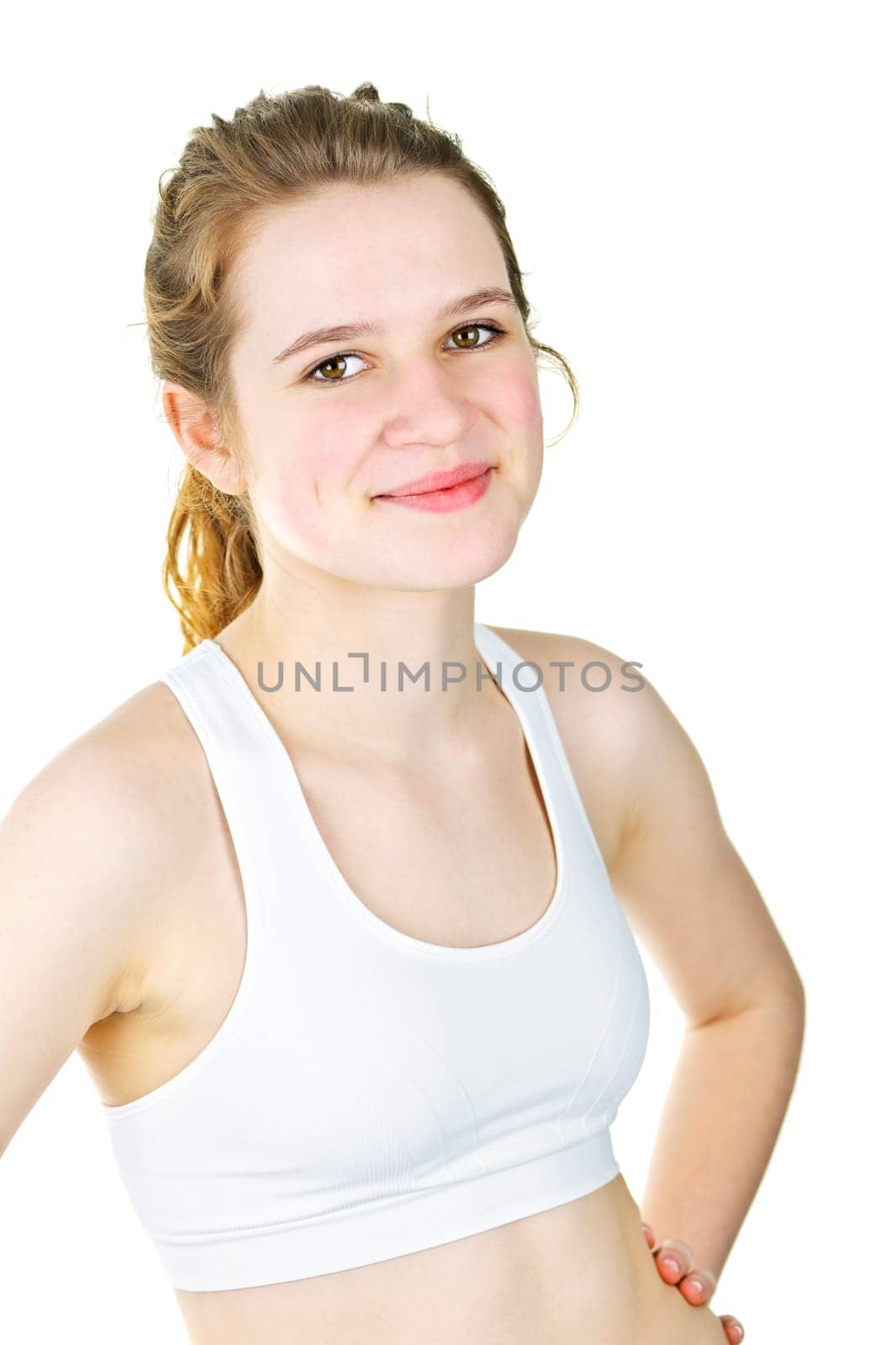 Pretty fit young woman ready for workout on white background